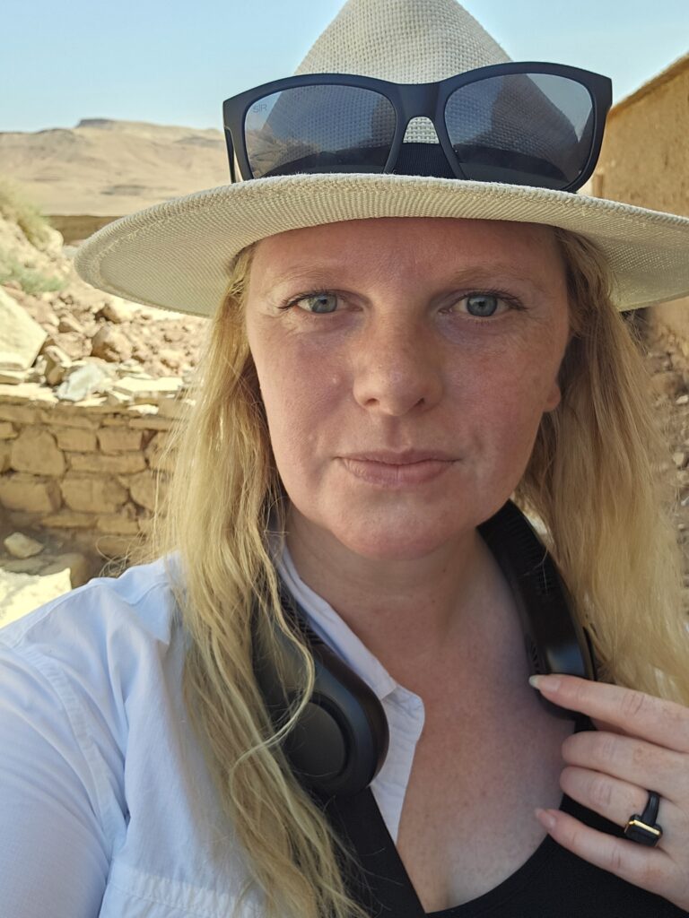 Wearing a neck fan in Morocco on a hot day